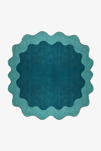 Modern scalloped round rug in teal and turquoise wool, a bold 6 ft circular statement piece for colorful living rooms or unique bedrooms