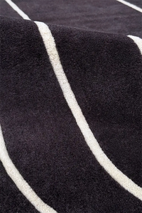 close-up texture of black and white modern square rug