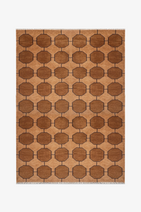 honey gold brown patterned rug with geometric design on a plain background | 6x9