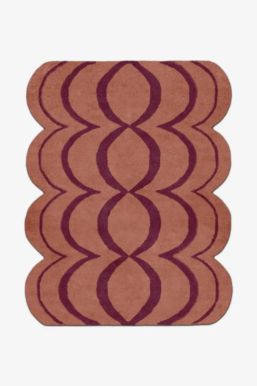 burnt orange rug with wavy pattern on a white background