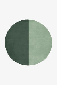 sage green wool round rug in dark and light tones for boho and colorful interiors