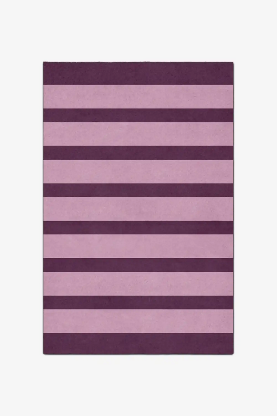 Purple and pink striped rug on a white background