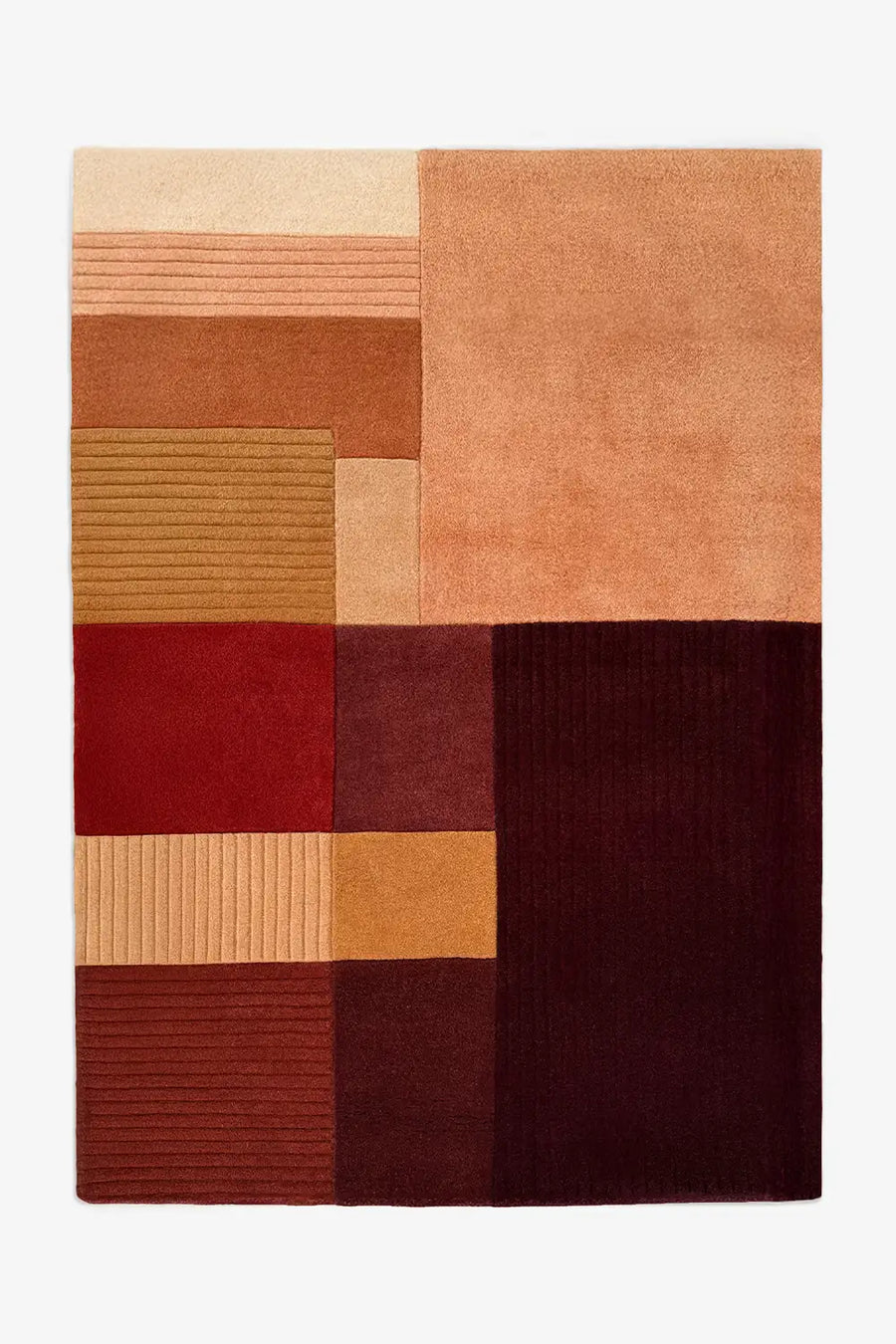 Rectangular rug with a geometric pattern in shades of brown and red on a white background