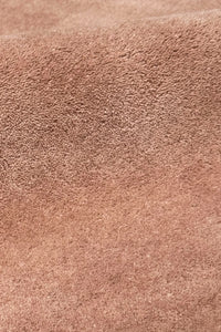 High-pile tan wool square rug texture, highlighting the soft medium-pile tufted surface, ideal for square kitchen rugs or accent areas brown