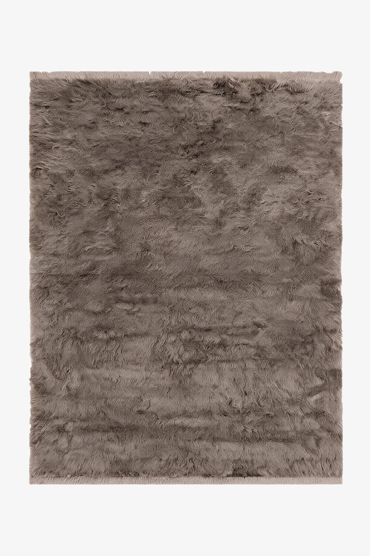 A rectangular shaggy area rug in a taupe-gray color, shown flat against a plain white background.