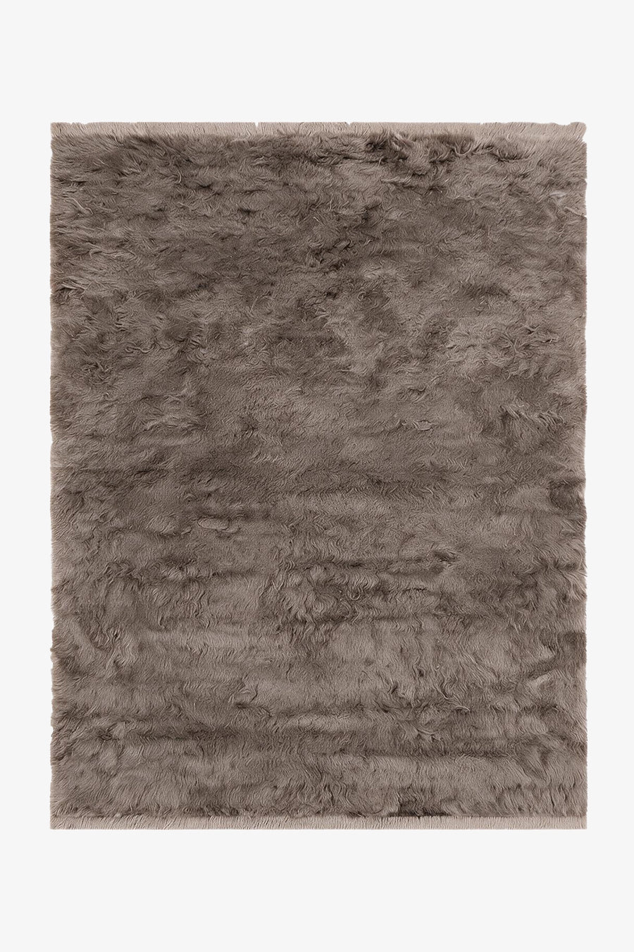 A rectangular shaggy area rug in a taupe-gray color, shown flat against a plain white background.