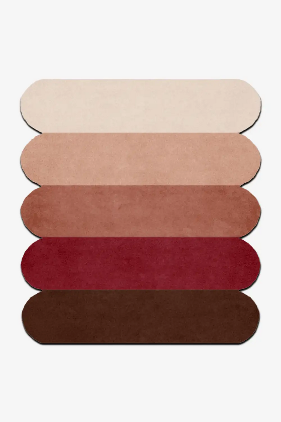 custom wool rug with scalloped edges shown in warm earth tones from light neutral, rust, to deep brown