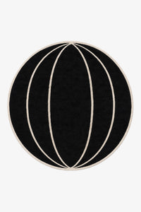 black round rug with arched stripes in contemporary design