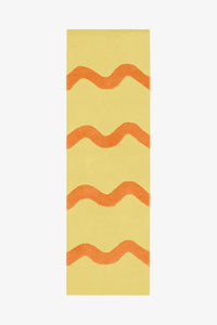 Sunshine yellow and orange wool runner rug with bold wavy stripe design, colorful retro runner rug