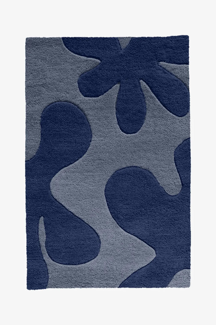 8x10 navy and slate blue abstract wool rug with soft high-pile hand-tufted finish and playful design
