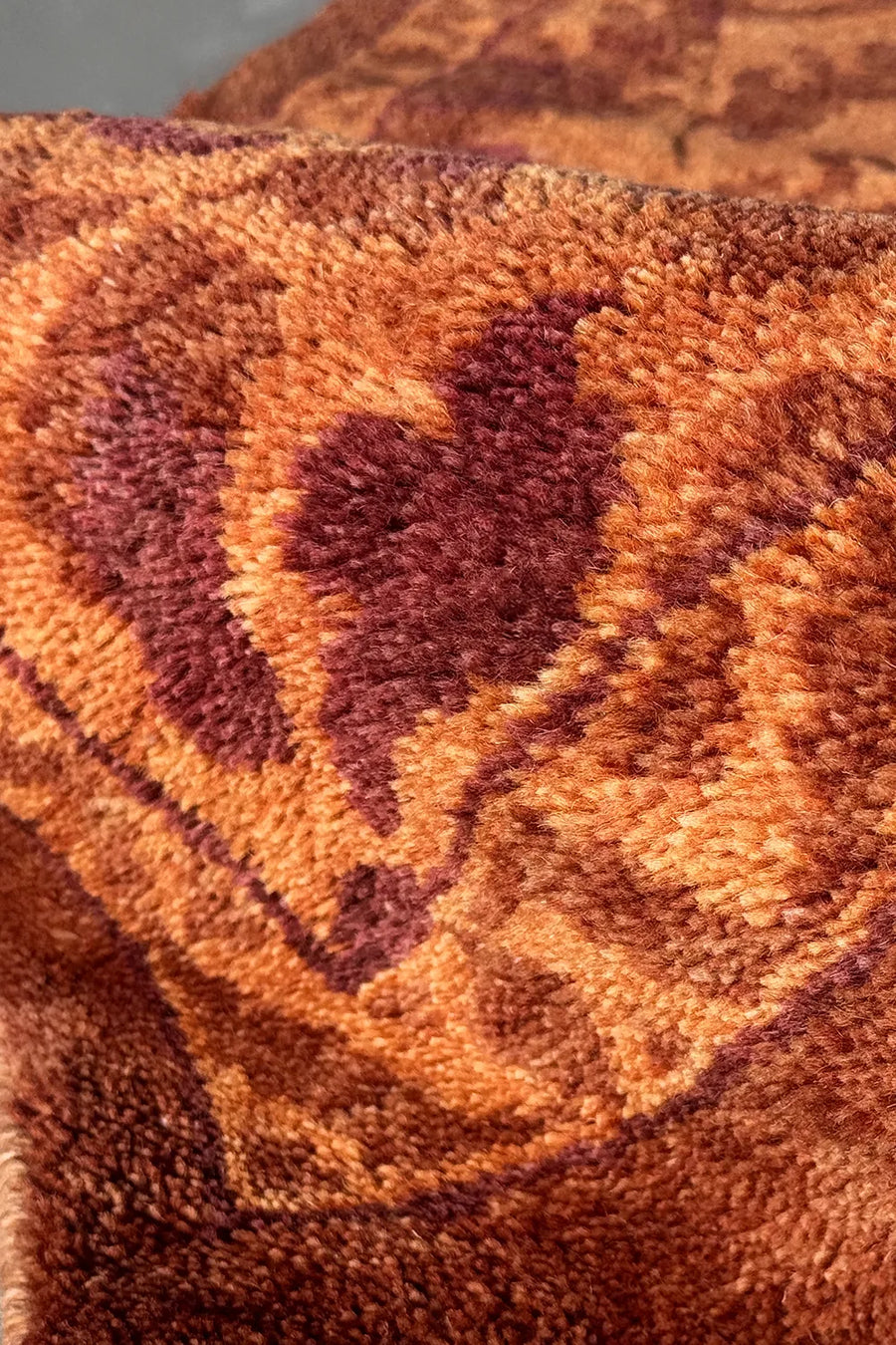 Amber Vine wool area rug featuring intricate vintage-inspired floral designs.