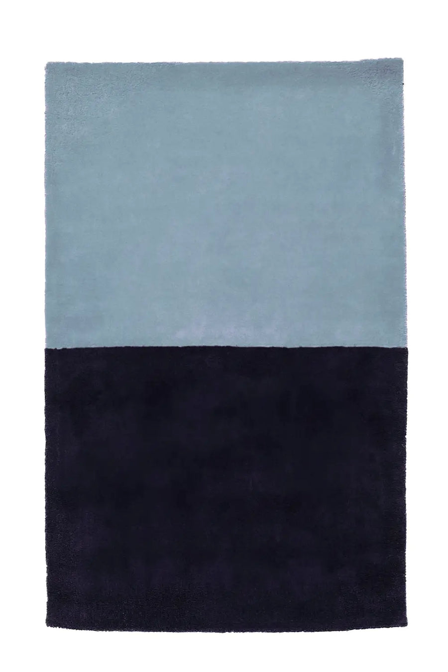 Thick blue and navy wool rug with bold color blocking
