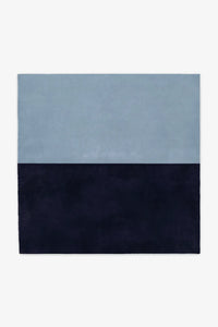 Two-tone blue and navy wool square rug available in 6x6 or 8x8, perfect for coastal modern homes, relaxed living rooms, or serene bedroom spaces indigo

