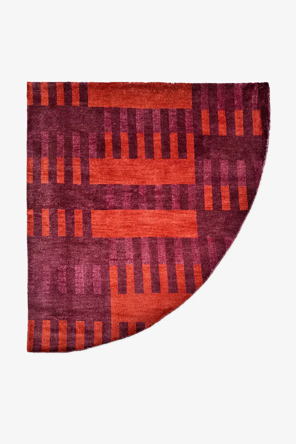 red corner rug with burgundy stripes showcasing its irregular shape for small accent areas