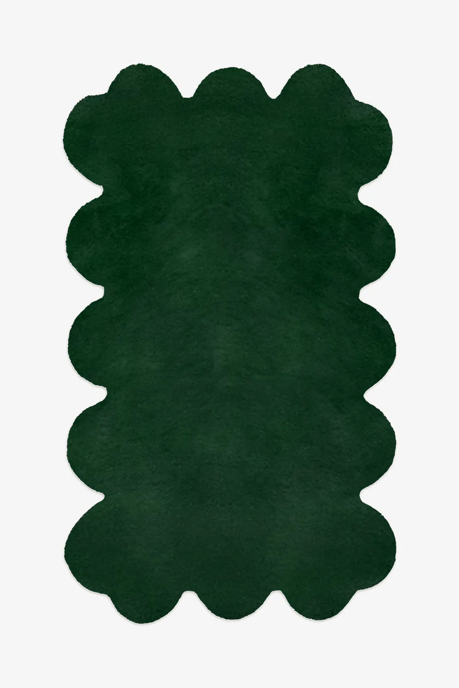 Dark green scalloped edge rug made from hand-tufted wool, perfect for mid century or eclectic living rooms

