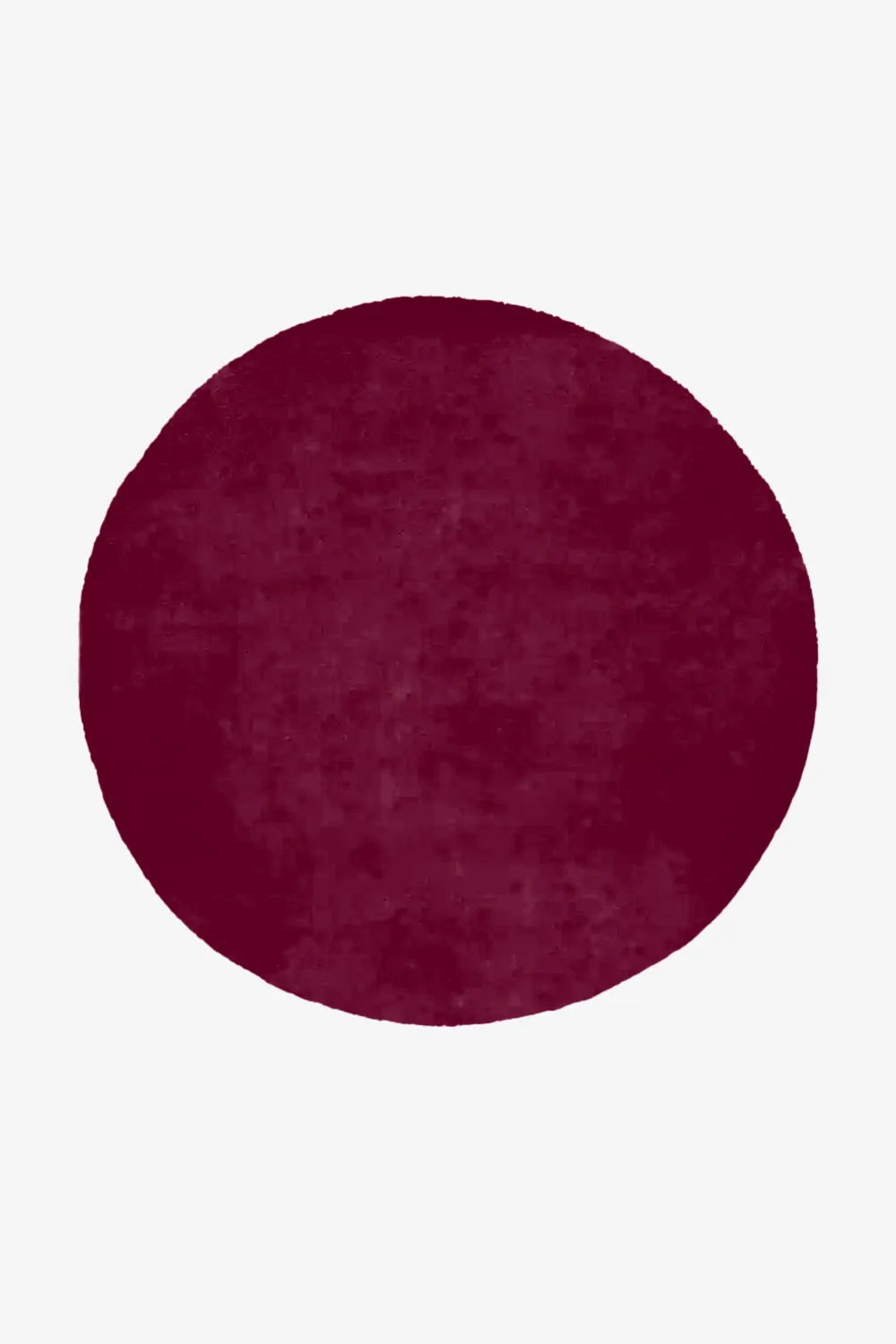 5' round burgundy rug with rich tone and sculpted texture, perfect as a boho or modern accent rug