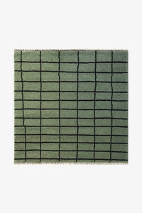 Green square wool rug with organic grid pattern, hand-knotted from wool and perfect for colorful modern interiors