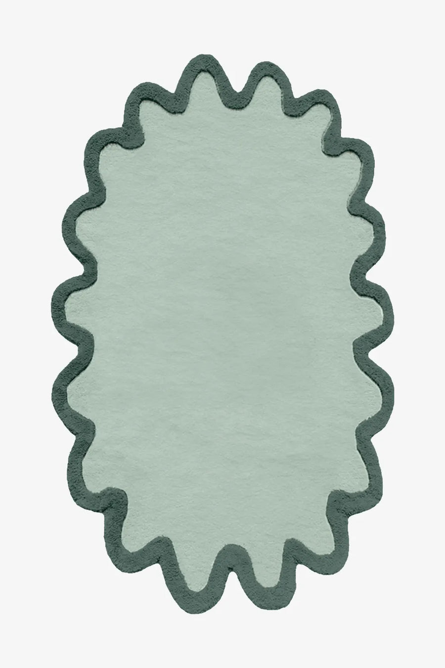 Organic sage green scalloped wool rug with dark trim oval shape in 8x10 size