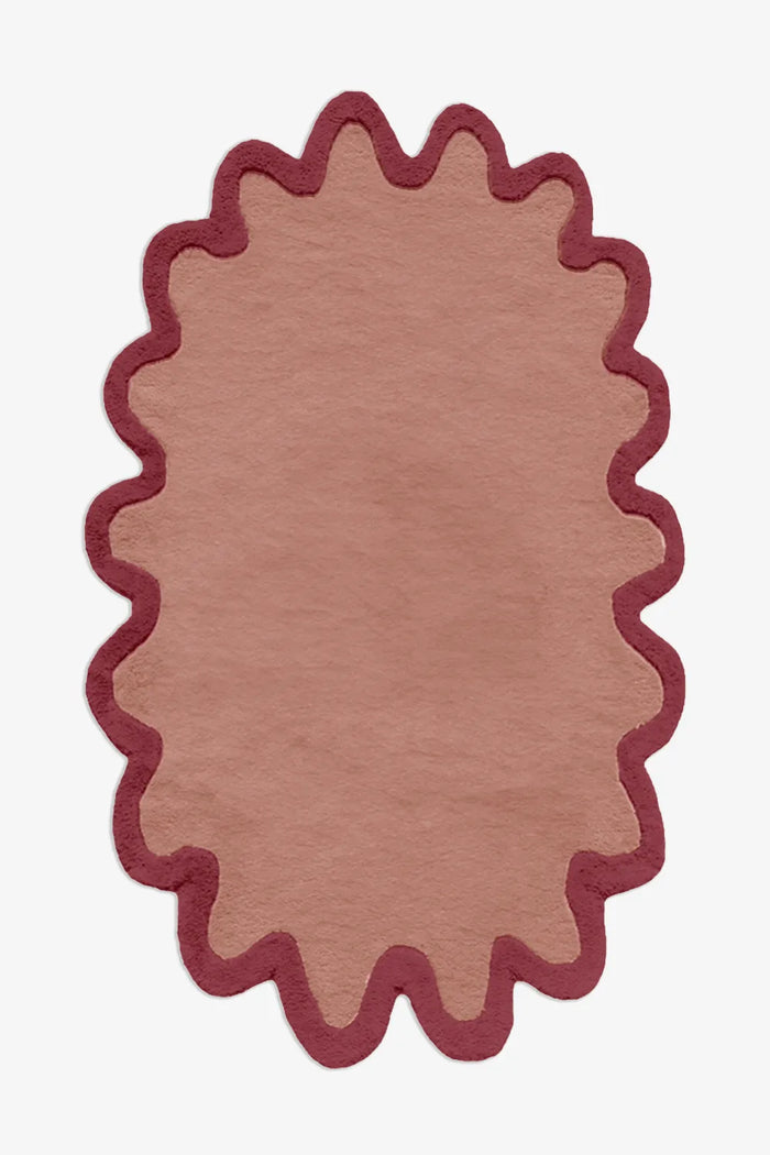 terracotta and rust 5x8 oval wool rug with unique scalloped border design