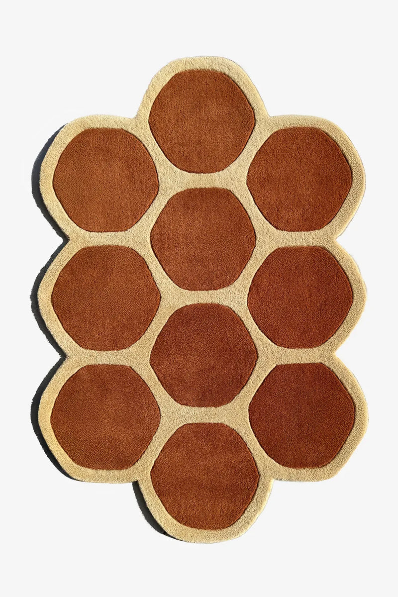 3x5 brown and cream irregular shaped rug in abstract honeycomb pattern, great as a funky modern area rug for living room or bedroom