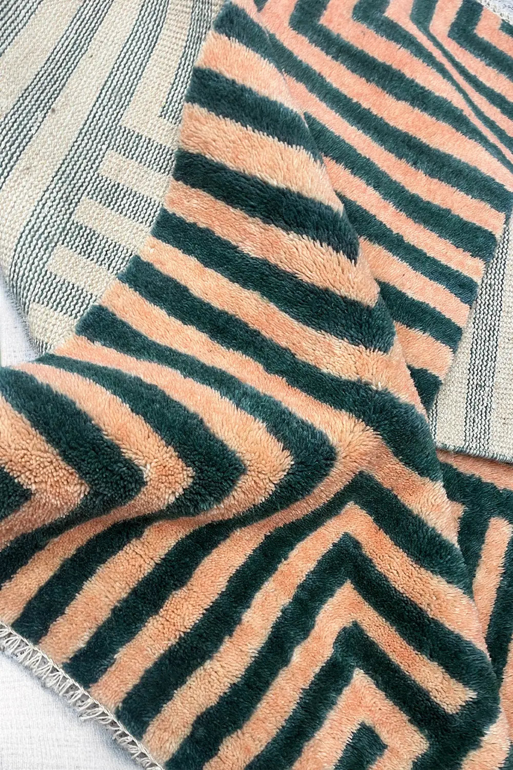 multicolor geometric shag wool rug with plush fluffy pile in green and tan
