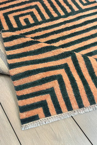Plush high pile texture close-up of the peach and green striped shag rug, ideal for modern colorful rug collections