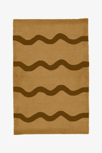 Warm tan and brown wavy stripe wool rug, modern southwestern-inspired area rug for cozy interiors