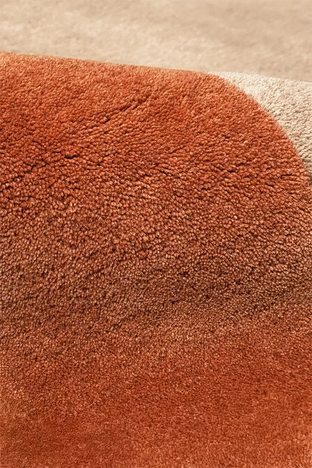 plush tan and rust burnt orange wool rug