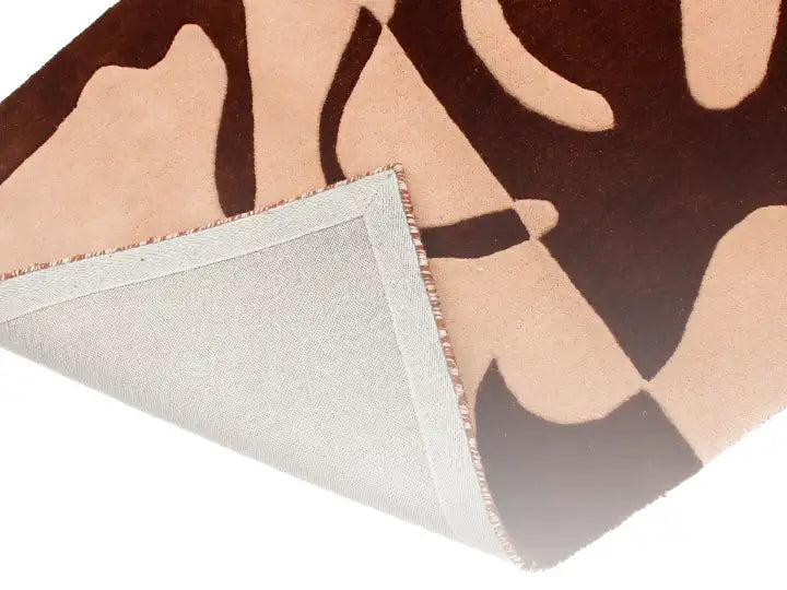 Luxurious hand-tufted wool rug in brown and beige, perfect for large living rooms