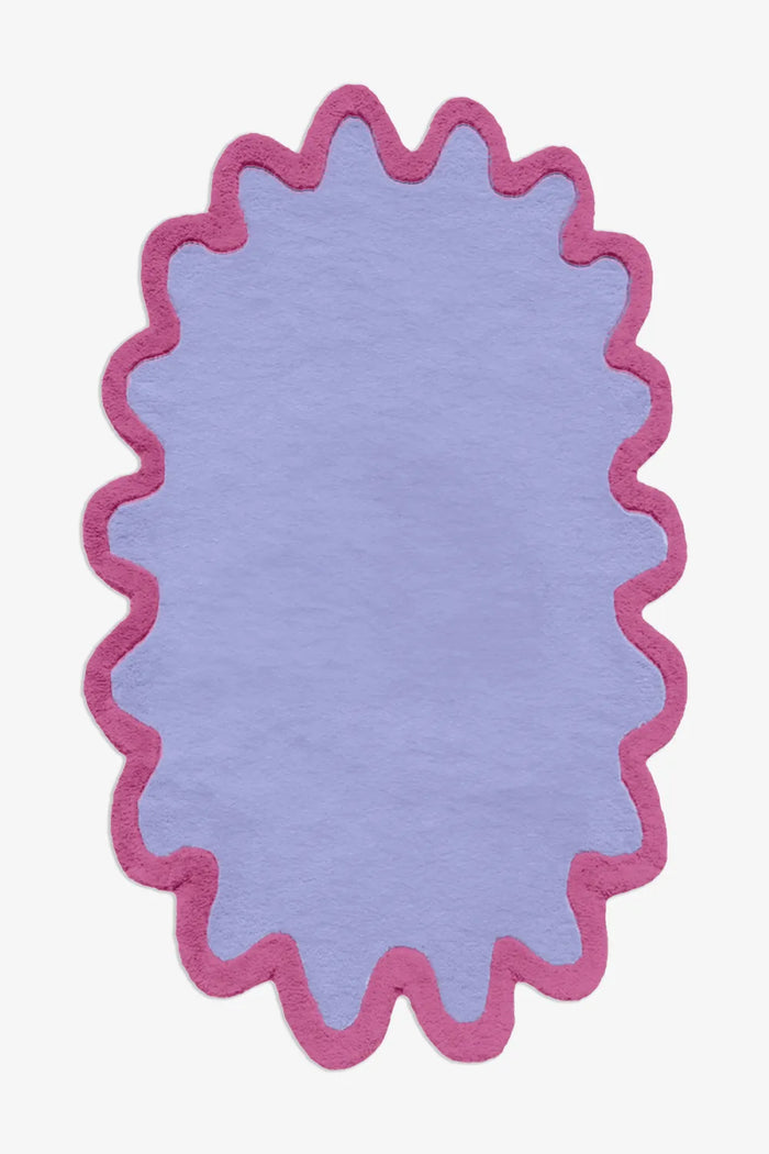 Lavender wool rug with playful pink scalloped trim, perfect for 5x8 or 6x9 colorful interiors cornflower magenta