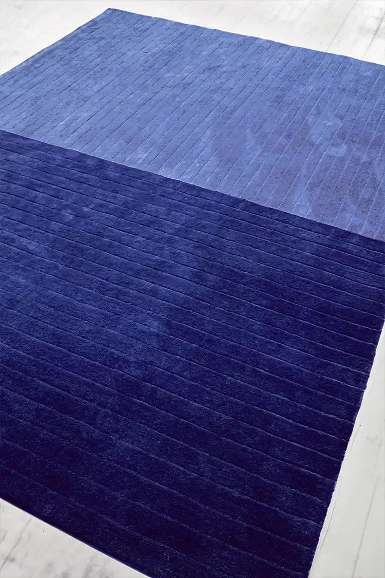 textured detail of the ridge duo tufted rug by jubi a modern area rug with ribbed details for contemporary interiors