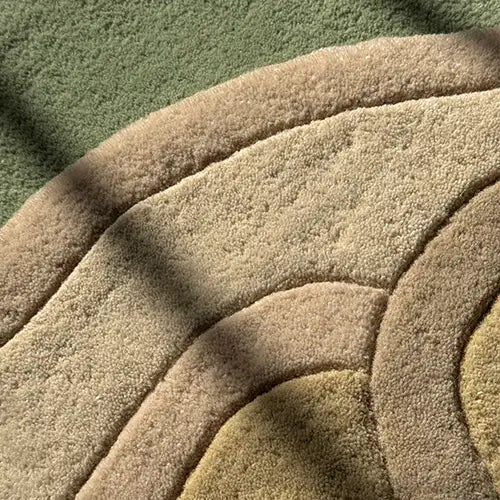 close up detail of natural hand tufted wool rugs by jubi