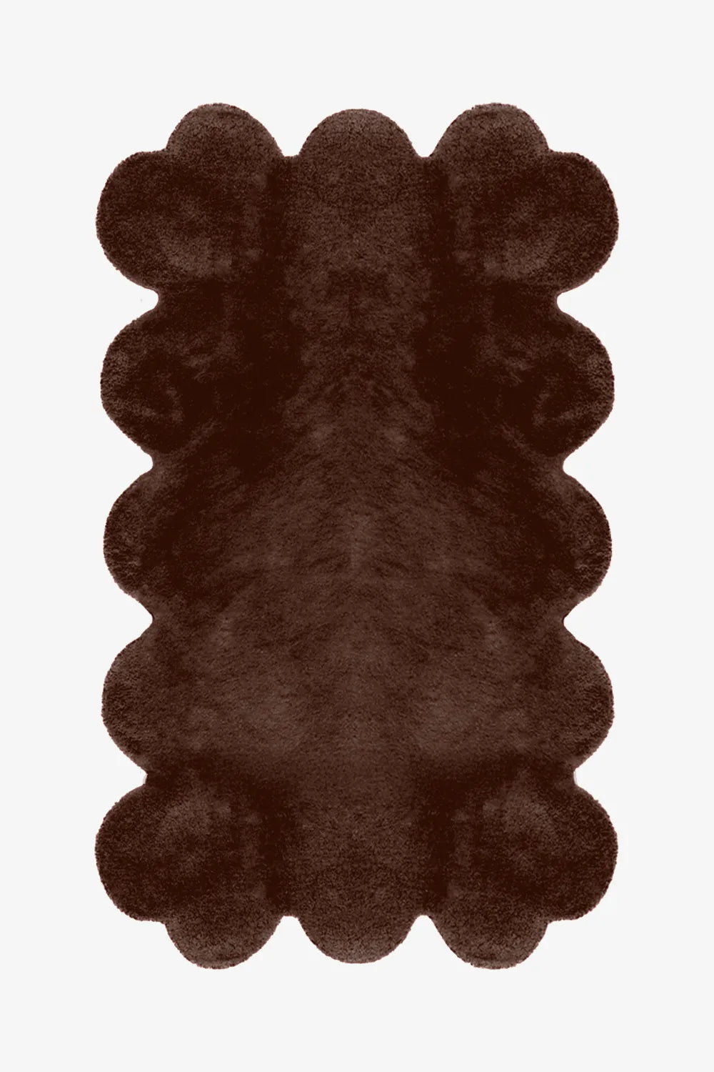 Rich brown scalloped modern wool rug, cozy boho bedroom rug with playful wavy edges