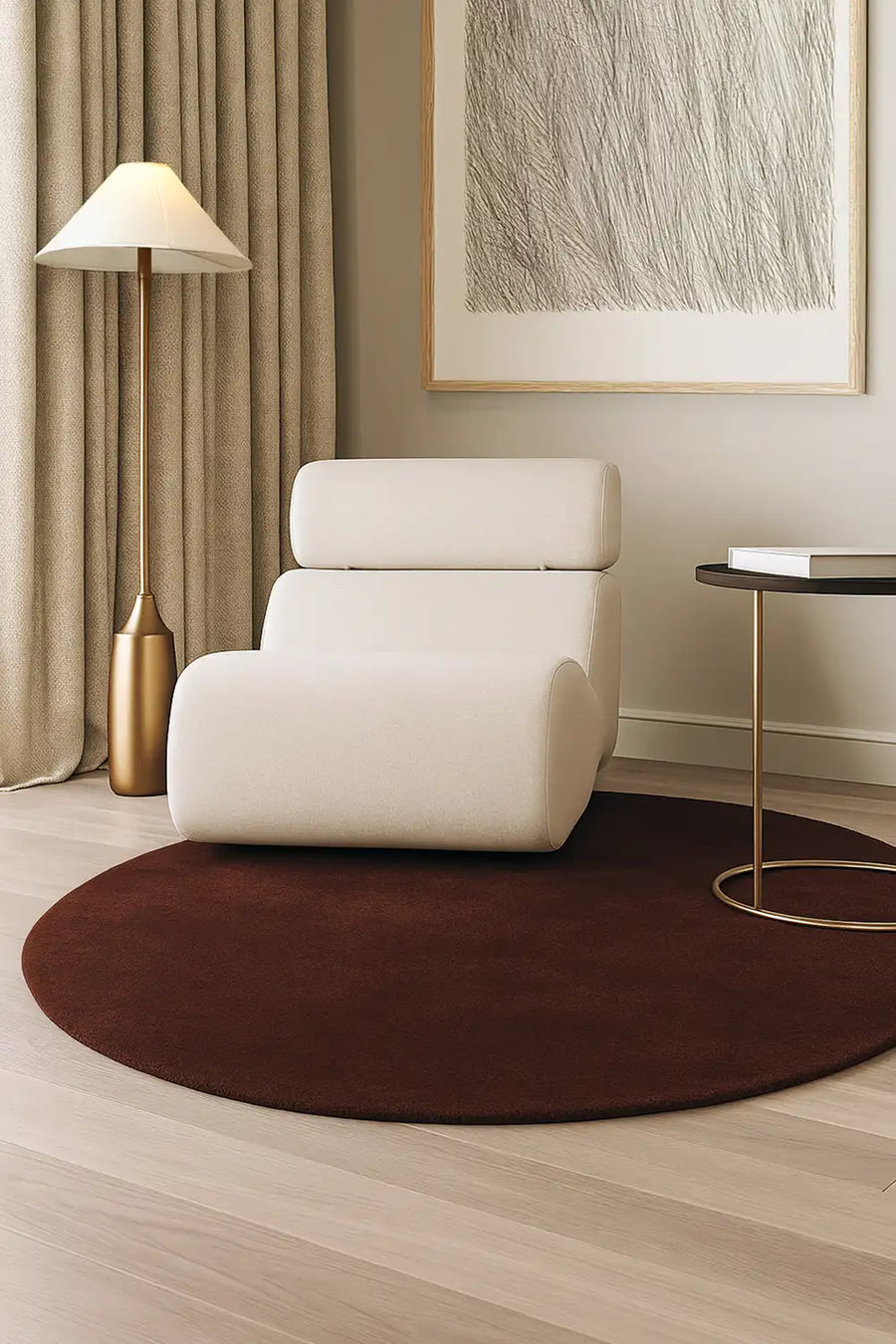 Chocolate brown round rug under accent chair in modern living room with wood floors and neutral decor