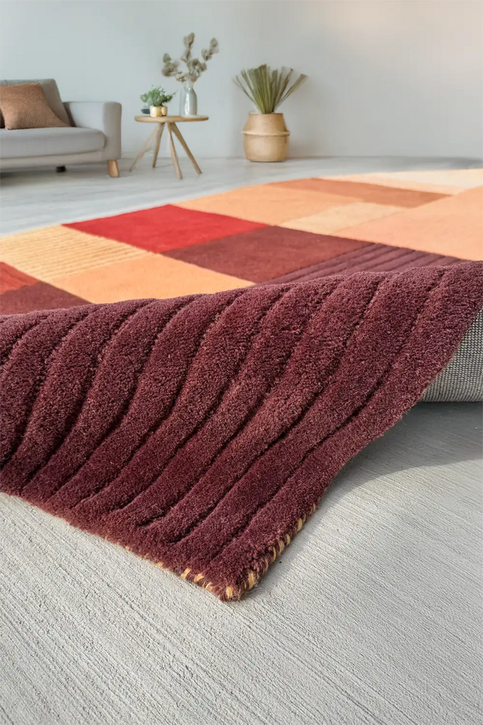 modern color block arched rug with ribbed texture detail styled in a modern boho living room