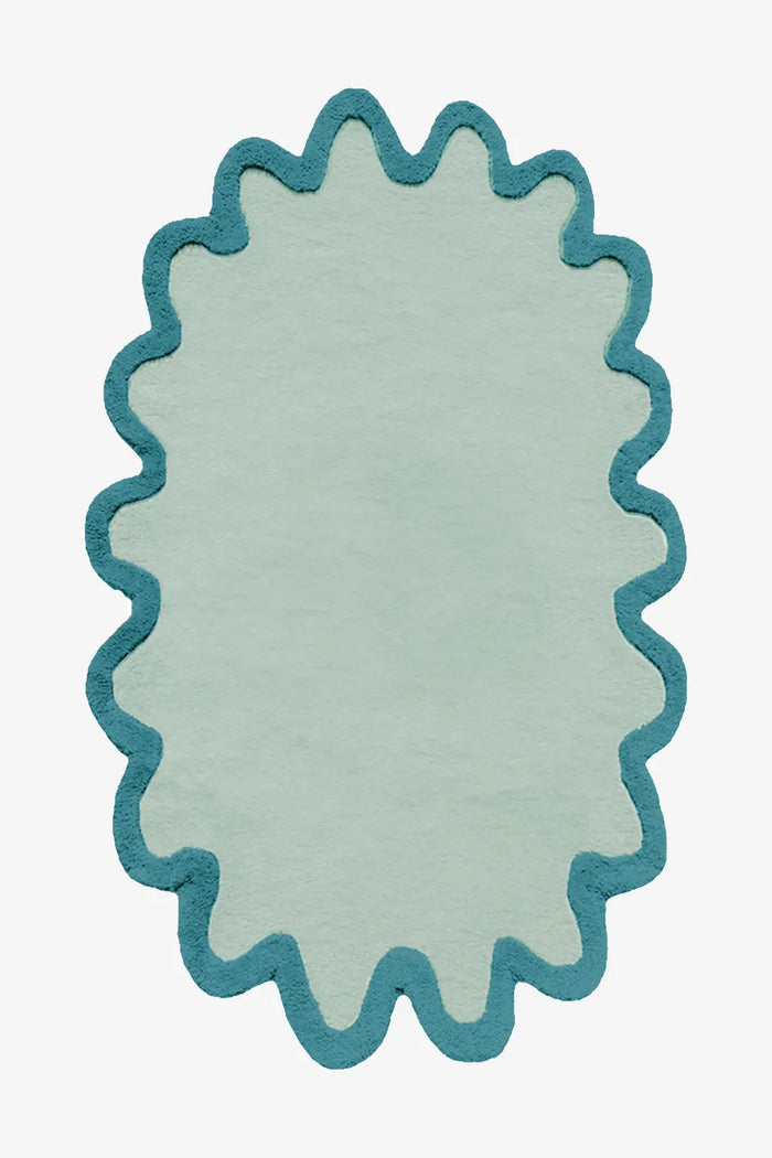 Light blue wool scalloped rug with teal wavy edge for cozy colorful modern interiors teal turquoise