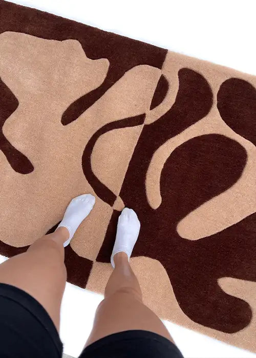 Unique brown retro-inspired rug with bold abstract patterns