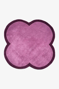 8x8 purple abstract flower shaped irregular rug with a dark scalloped border, perfect for kids' rooms or colorful living rooms