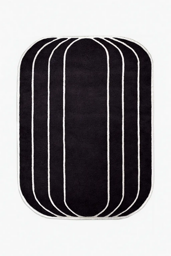 8x10 black and cream modern art deco area rug with rounded corners, perfect for modern and geometric interiors

