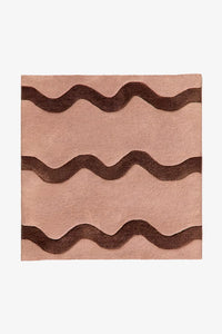 Neutral tan and brown square wool rug with playful wavy design, available in 8x8 and 9x9 sizing for modern kids' rooms and fun living spaces