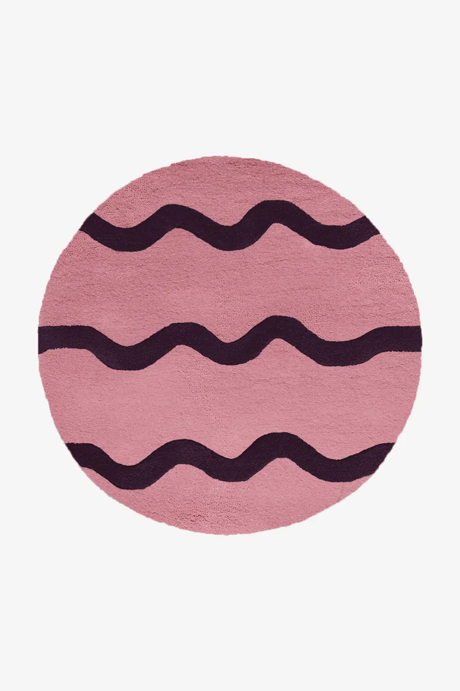 Round pink and purple wool rug with dark scalloped stripes, perfect as a playful accent rug for nursery or kids room