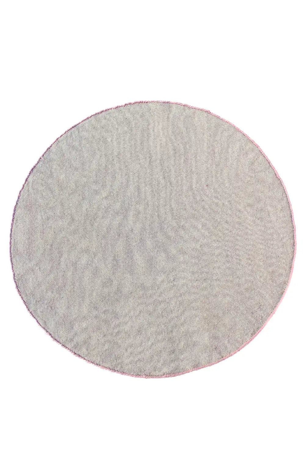 Hand-tufted round rug featuring a modern botanical floral pattern pink blue
