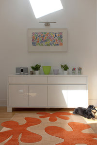 8x8 square rug styled in a bohemian-inspired living room lifestyle