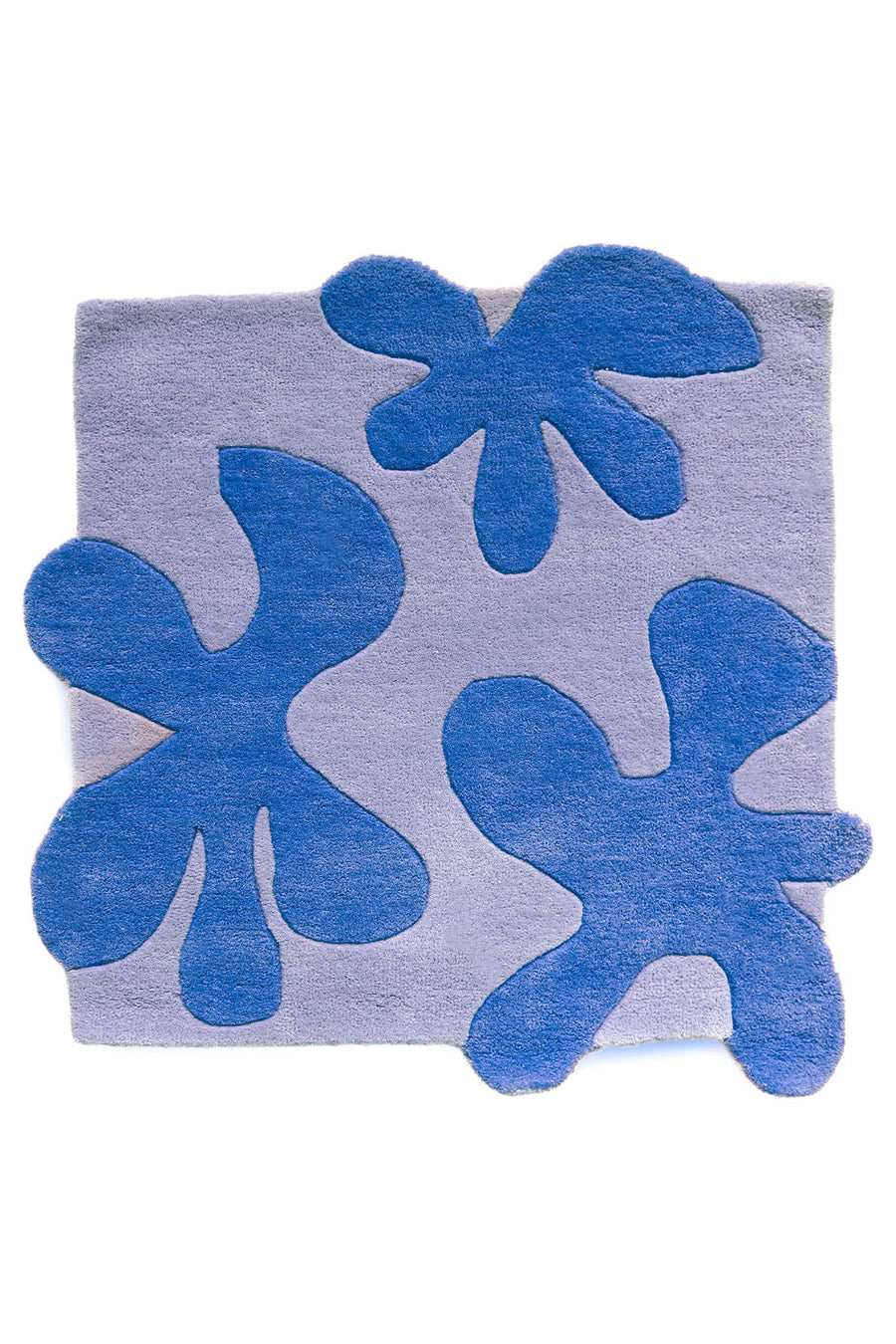 Square wool rug in two-tone blue with hand-tufted abstract flower forms