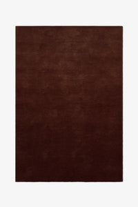 8x10 dark brown area rug in solid chocolate wool, hand-tufted and ideal for modern living or dining rooms