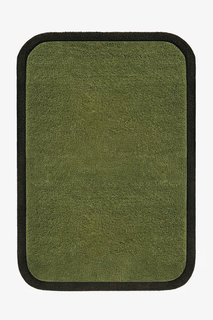 5x8 olive wool rug with dark border and minimalist modern look