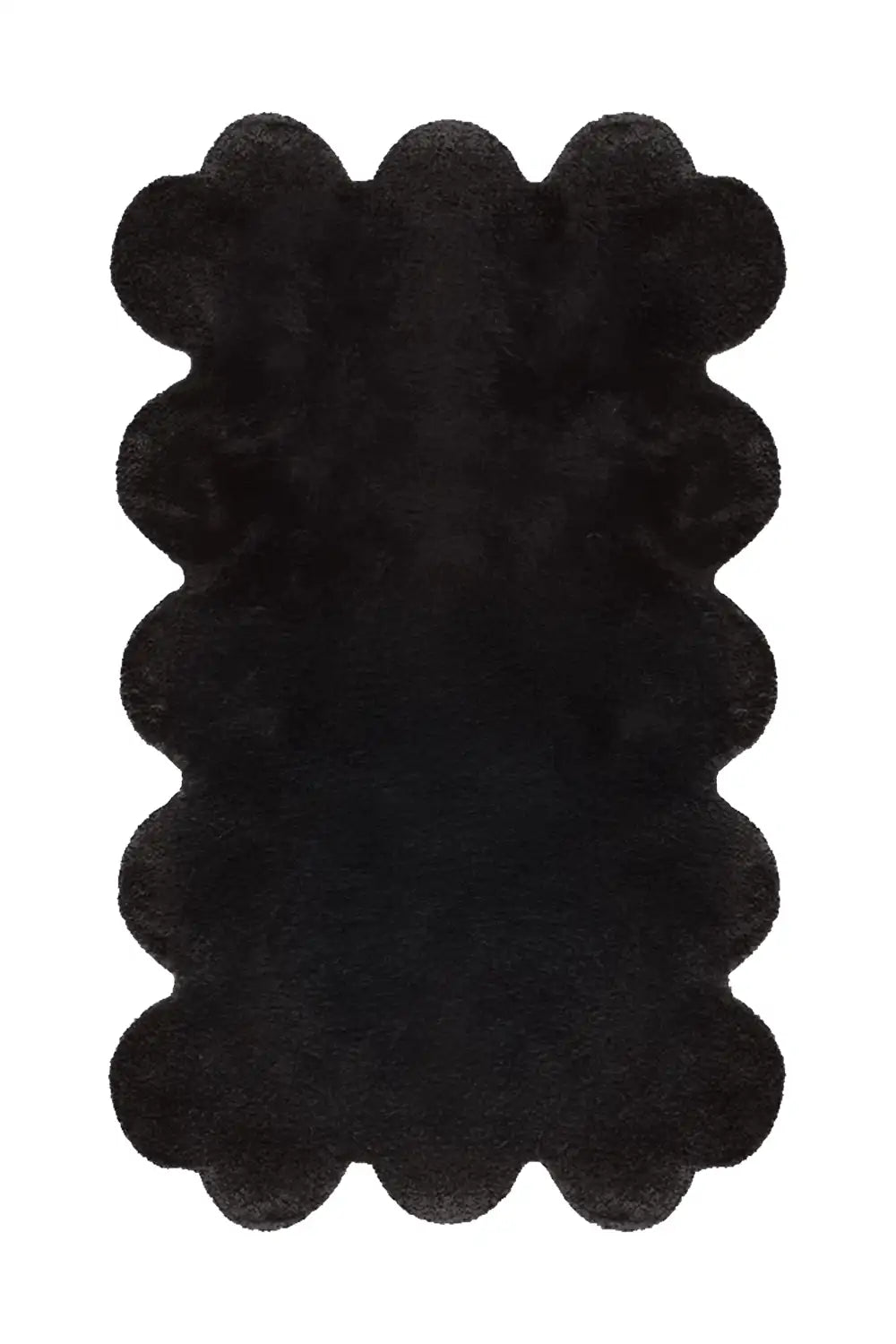 Black scalloped-edge wool rug with plush texture
