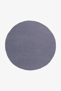Dusty blue 5x5 round area rug ideal for serene minimalist rooms