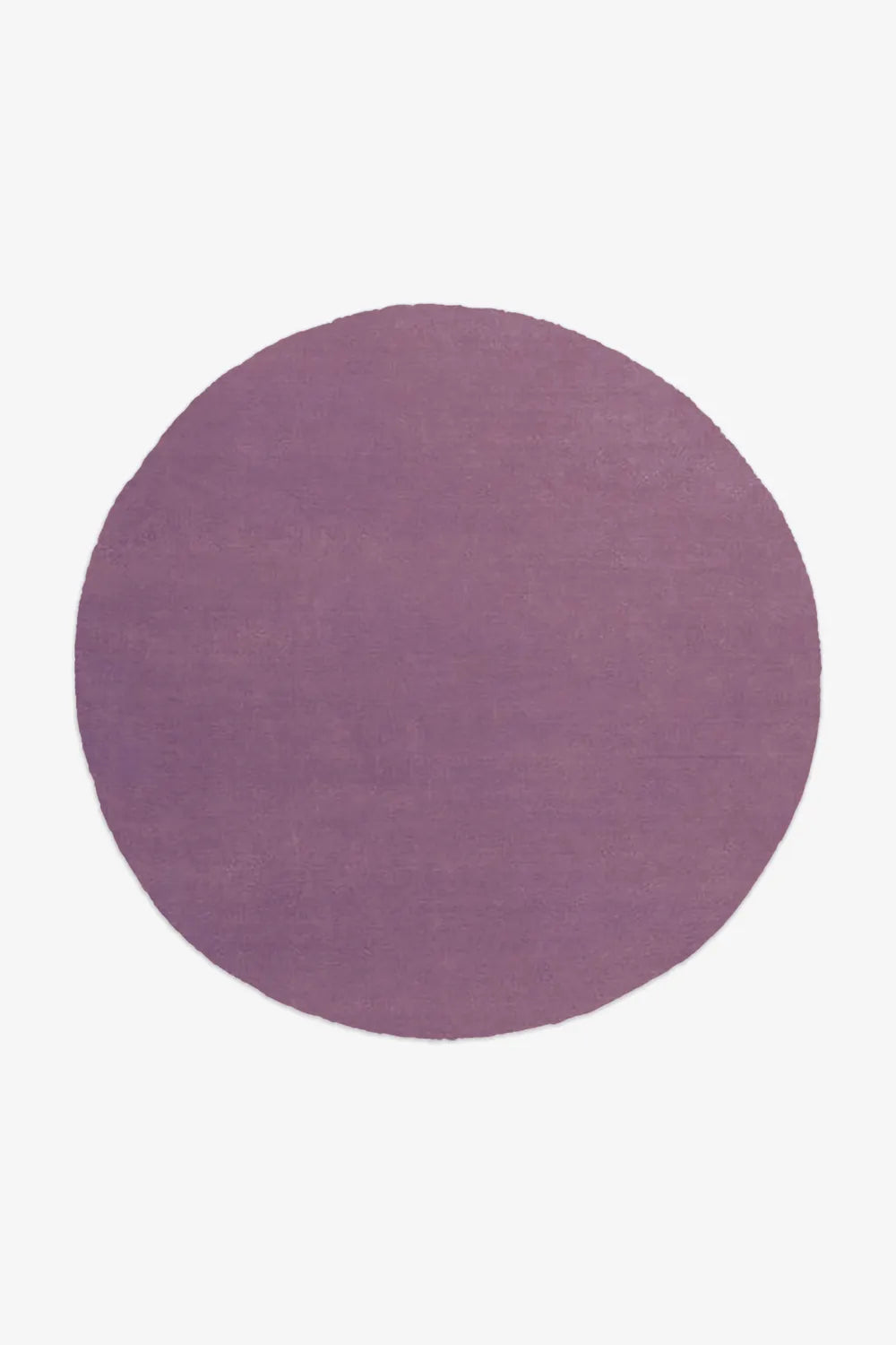 Muted lavender plum purple round area rug for soft colorful interiors
