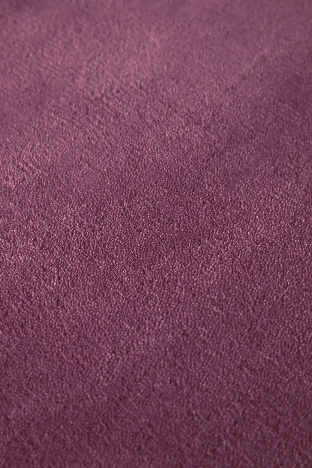 Soft, luxury square area rug in deep purple wool.